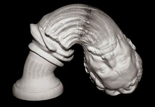 Illustration for article titled You can stretch out these fake marble sculptures like a slinky